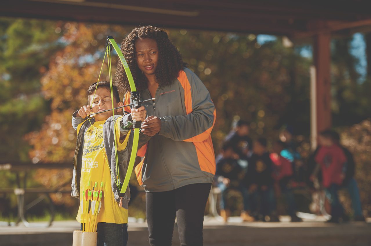 Focused on the shot at the BB-and-archery range.