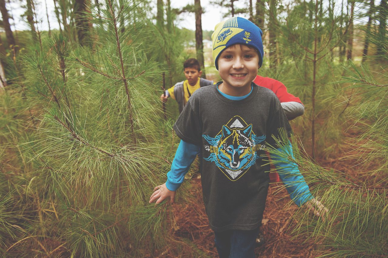 Working uphill with a walking stick.