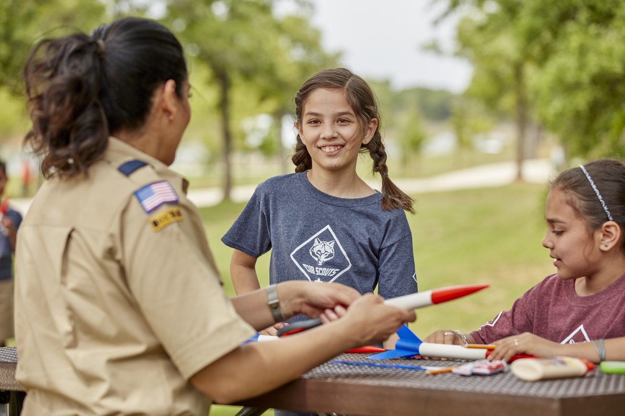 Building a model rocket at a den meeting.